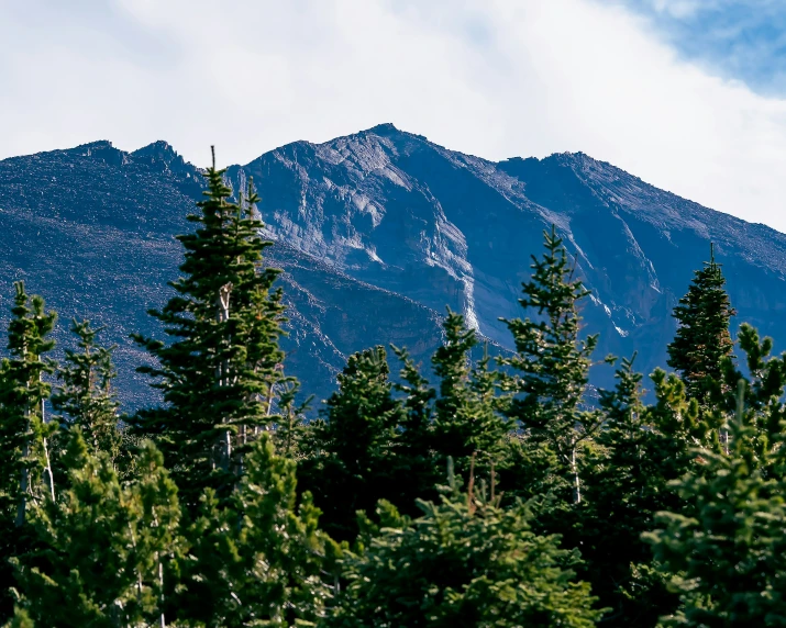 the mountains are covered with snow in the distance