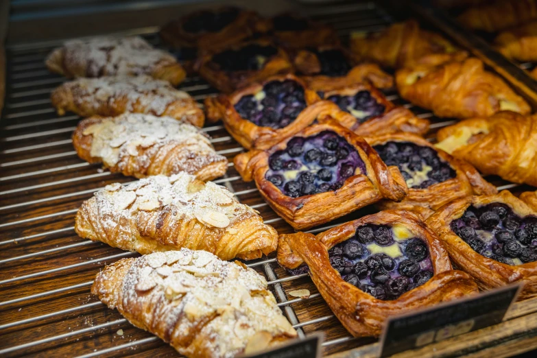 pastry items in the kitchen cooling on a grill