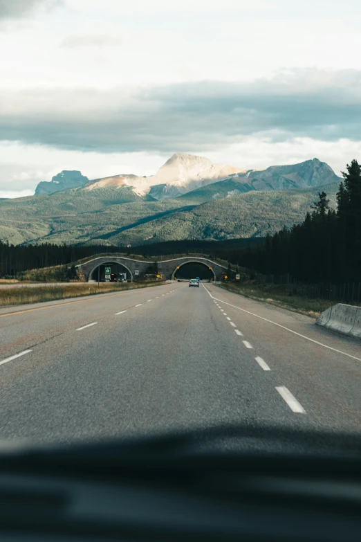 there is a highway going under a bridge