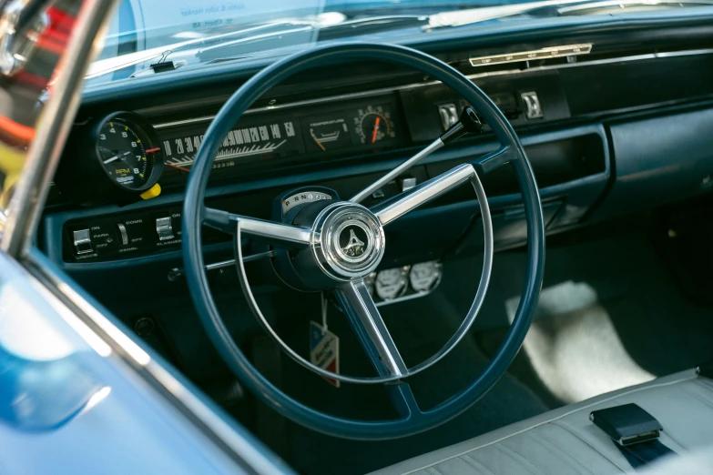 a car's dashboard with the steering wheel visible