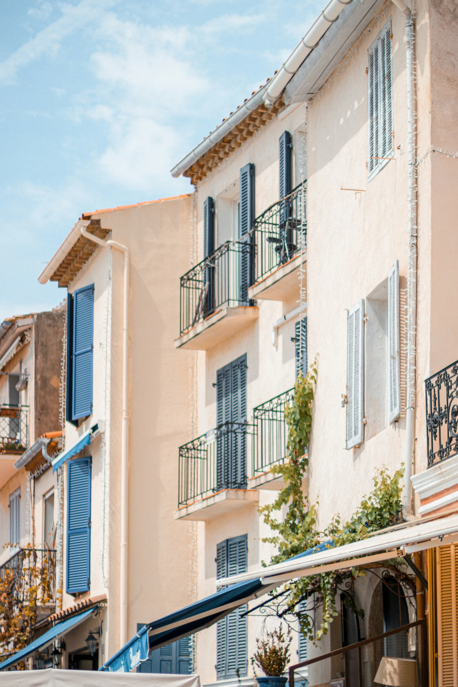 a building with many balconies and windows in europe