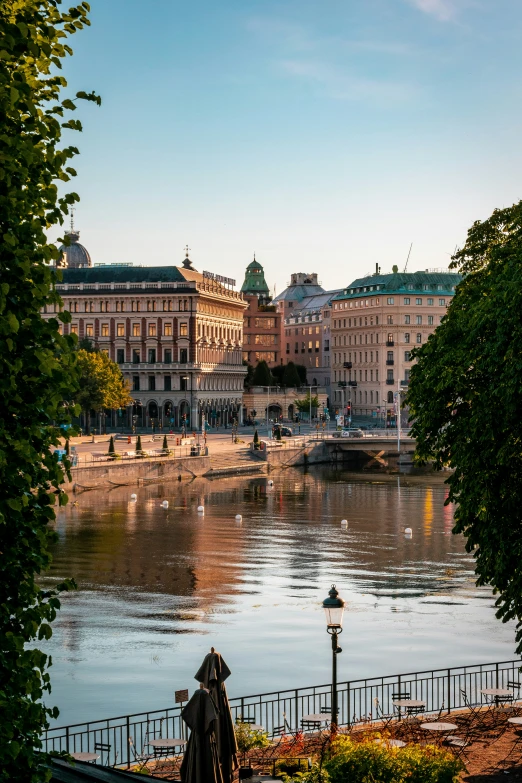 view of a lake and trees near city