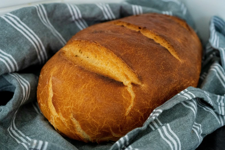 bread sitting in a basket on top of a table