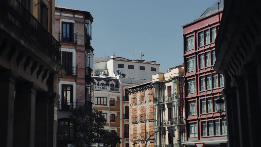 view of buildings and cars from a street