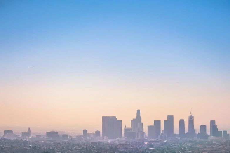 a hazy view of city from above