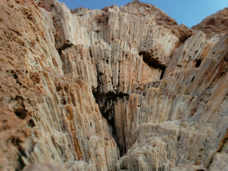 a mountain range has several different rock layers