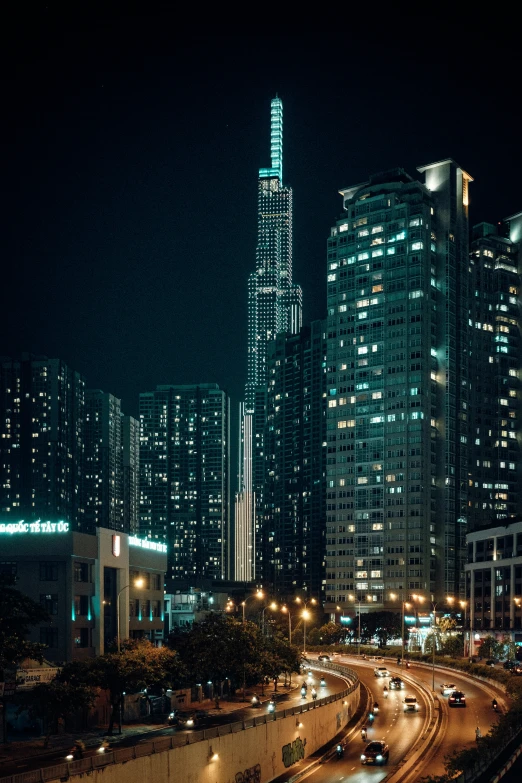 large city with many tall buildings lit up at night