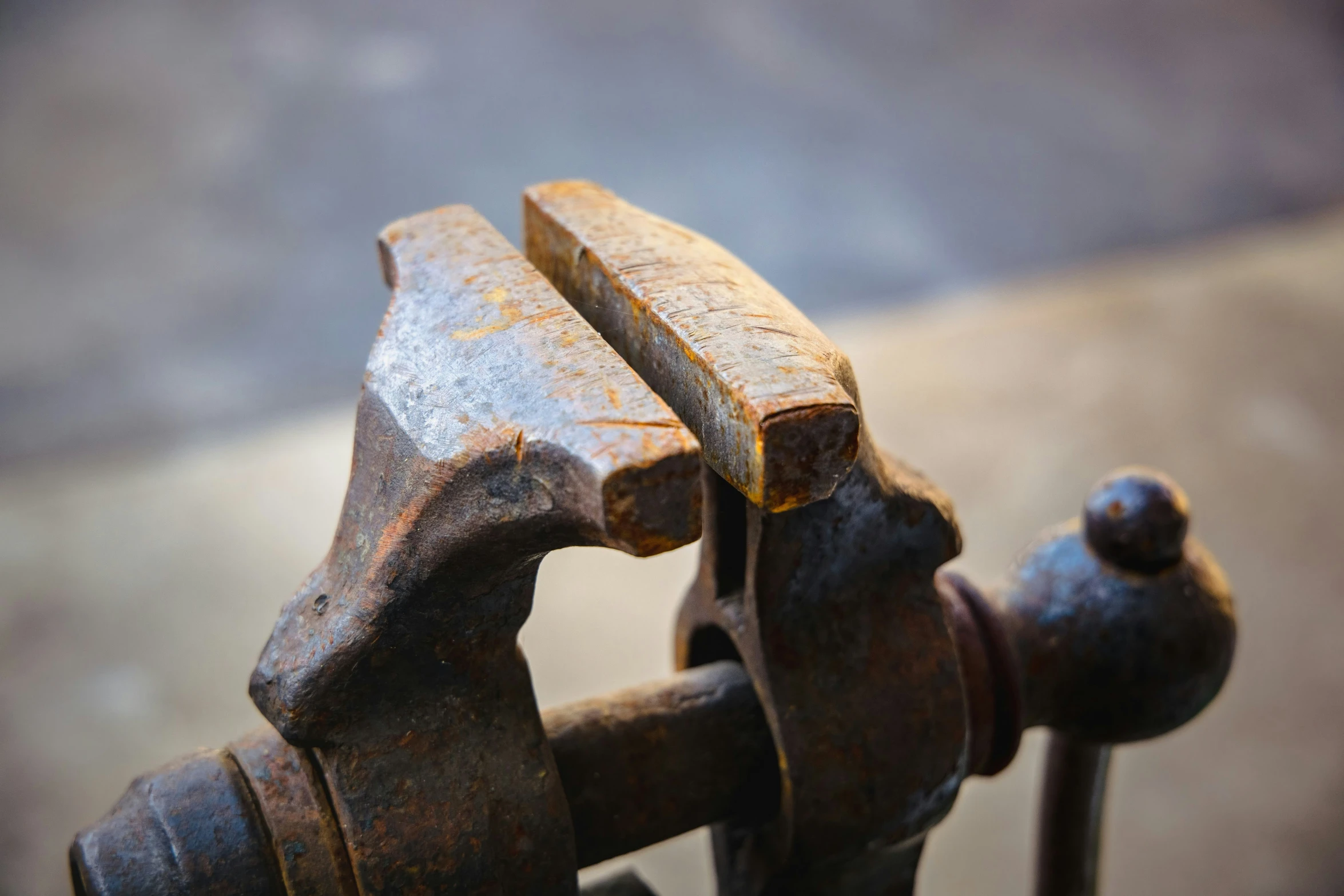 an old rusty and rusty iron gate on a sidewalk