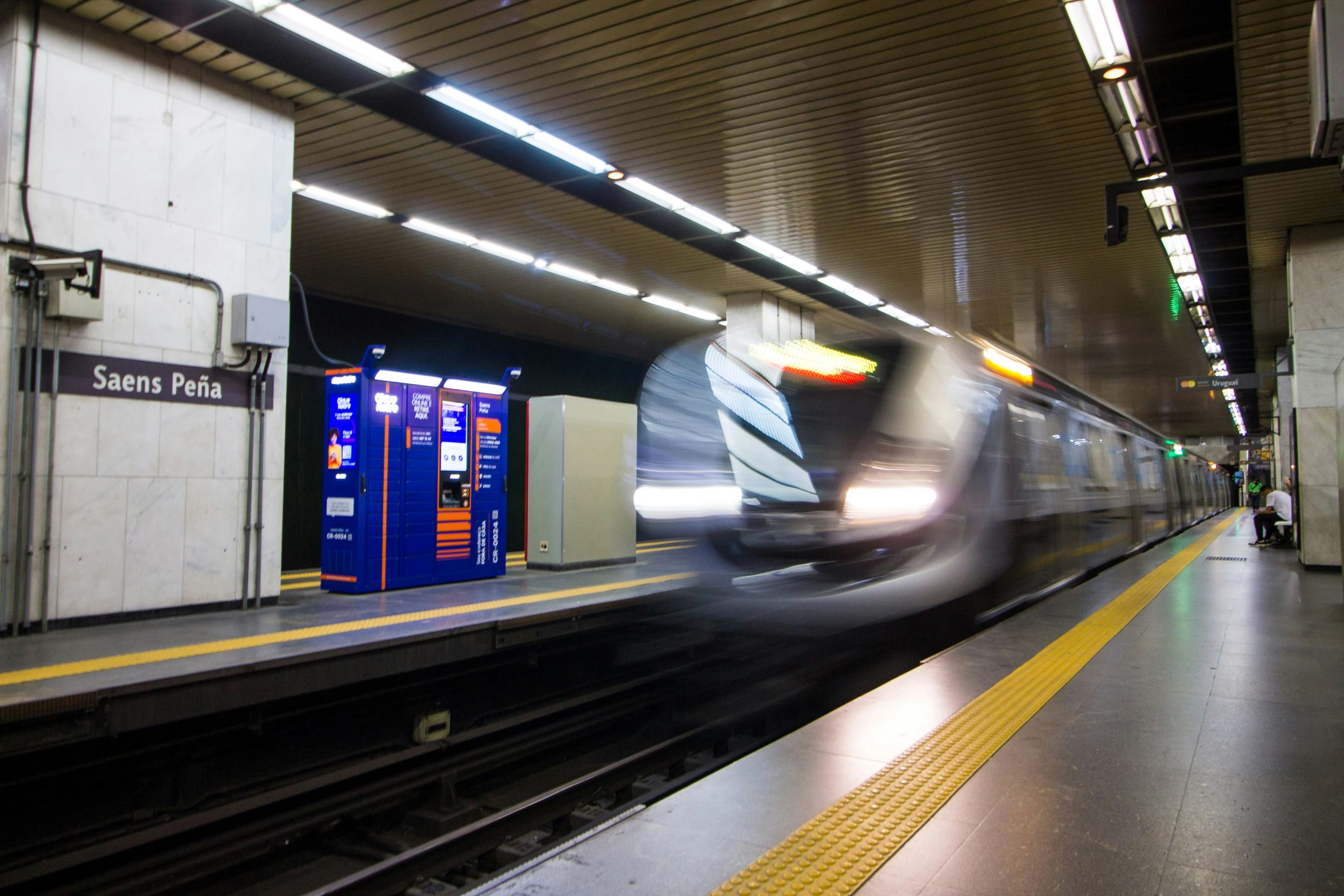 a large long train in the middle of a tunnel