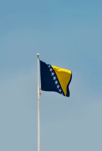 a picture of an american and yellow and blue flag