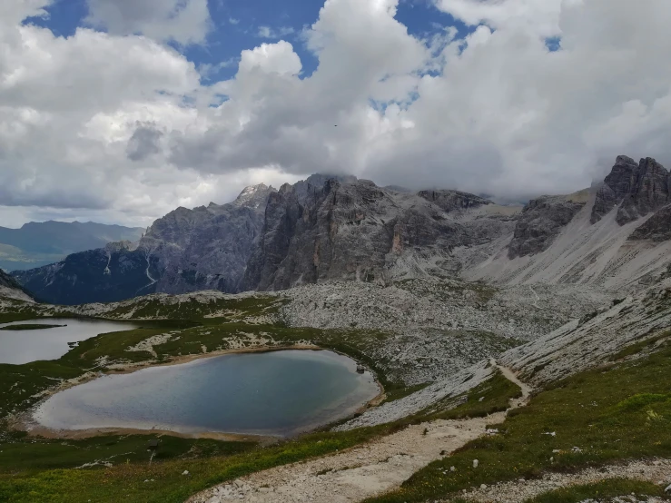 two large lakes are in the mountains beside each other