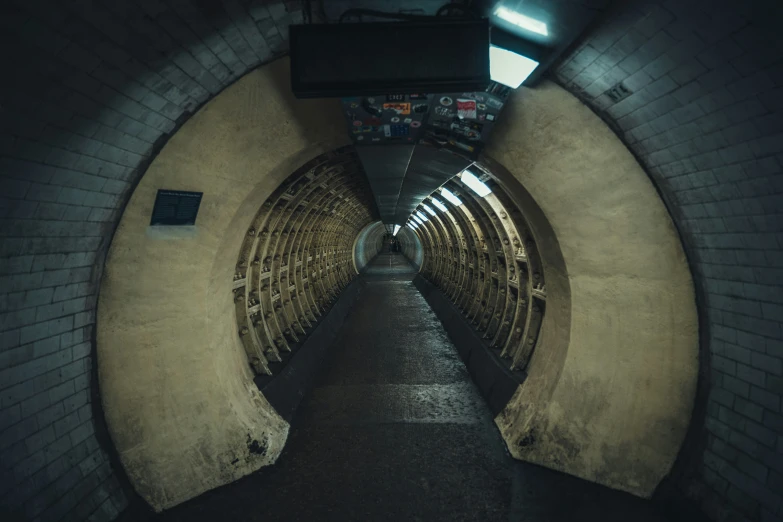 there is a tunnel in which people are walking inside