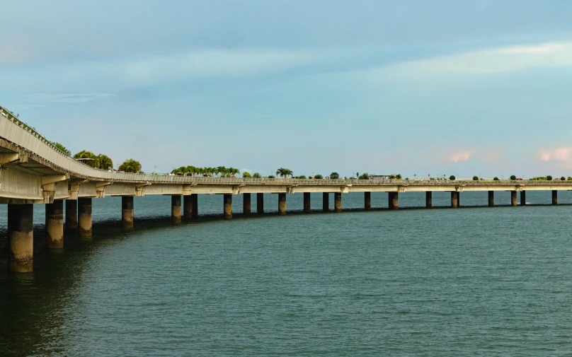 an old bridge has been opened up onto the water