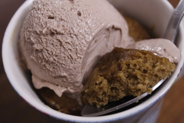 a cup with ice cream and chocolate