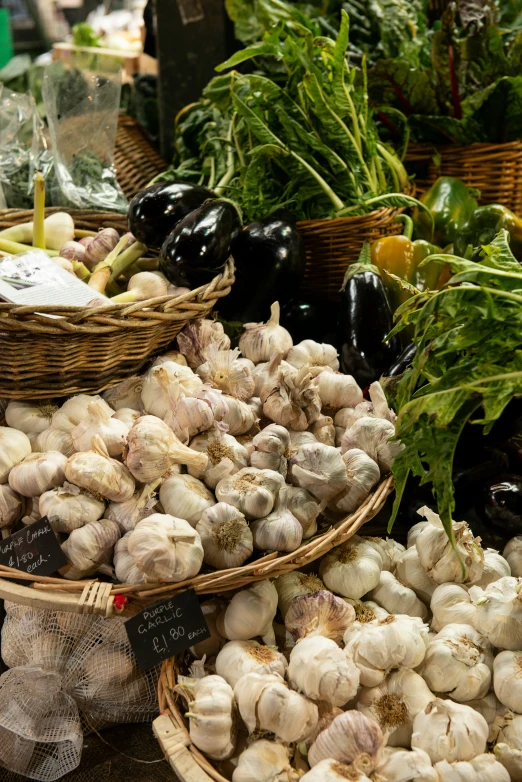 there are many baskets that have fresh vegetables in them