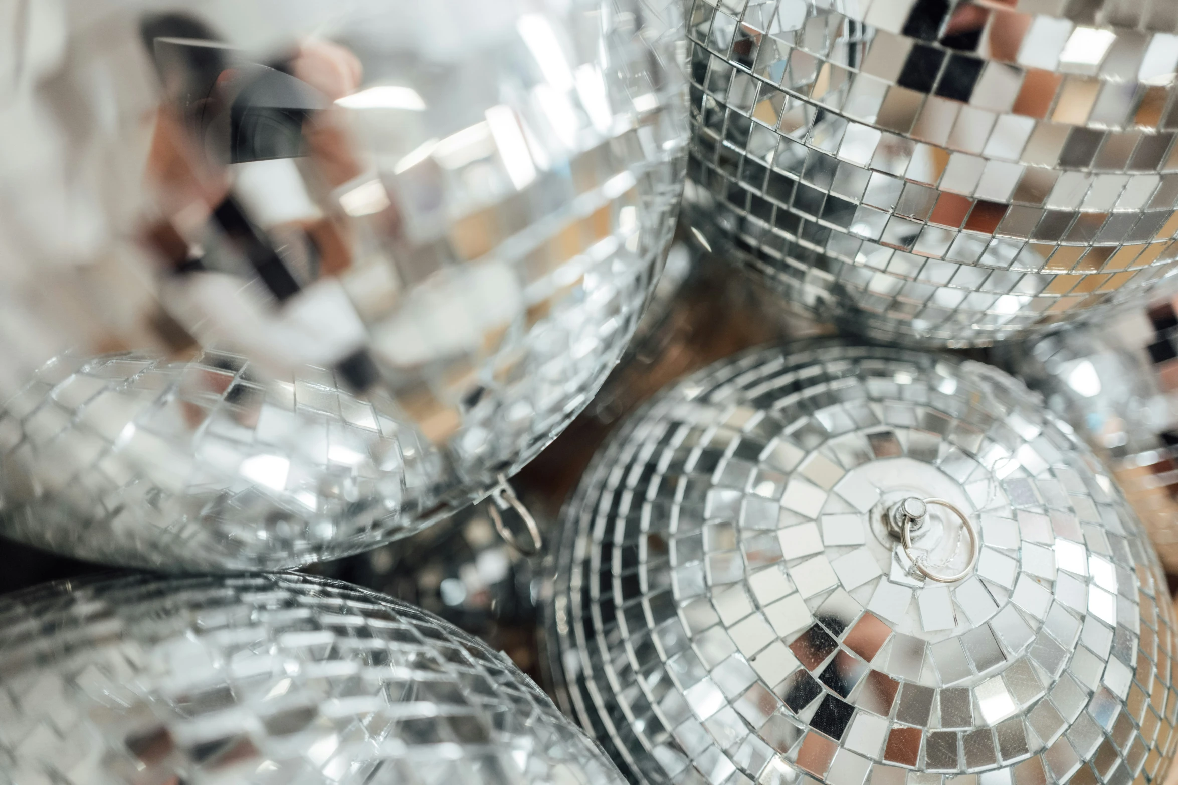 silver mirror balls placed on top of each other