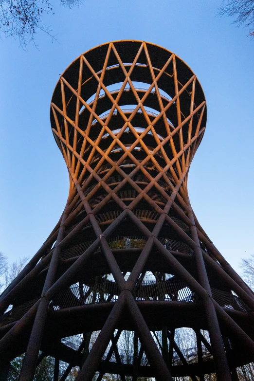 the top of a tower with many triangles in it