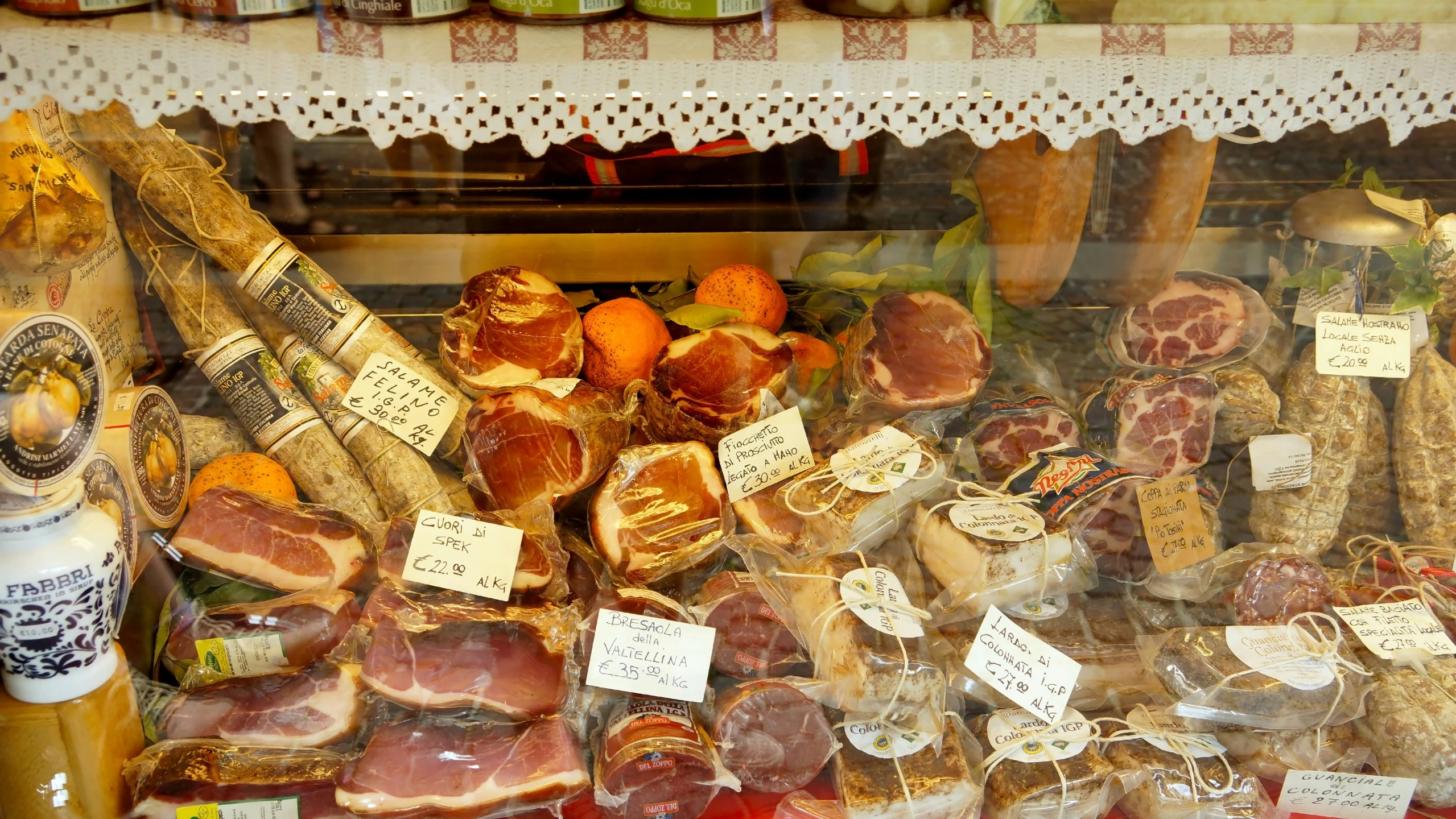 an assortment of meats in a store