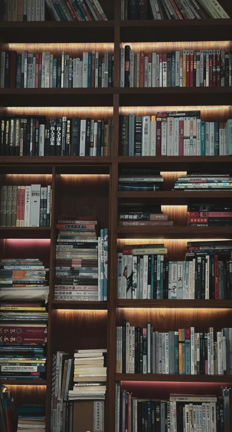 a large bookshelf filled with lots of books