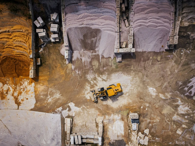 an aerial s shows several pieces of construction on a building site