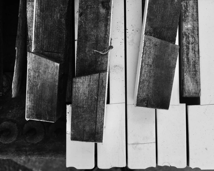 black and white po of a sheet of paper resting on a keyboard