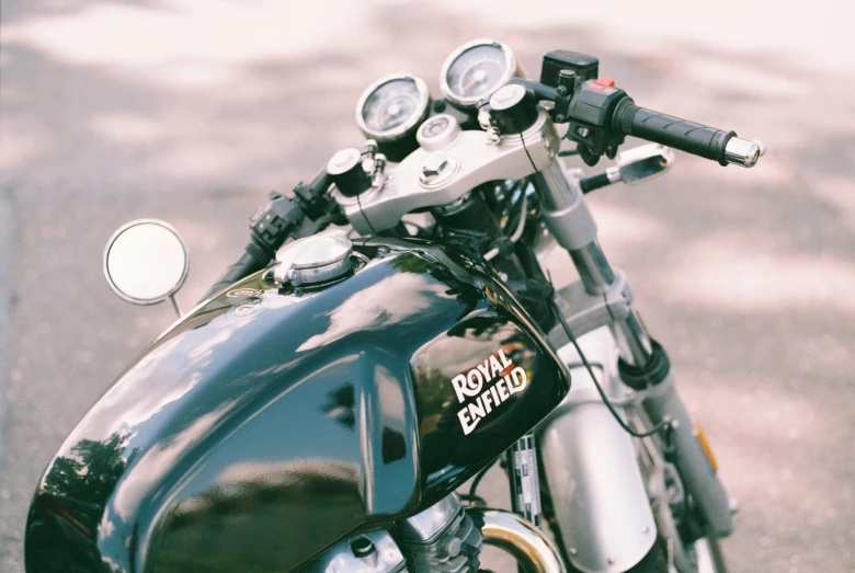 the back end of a motorcycle parked on the street