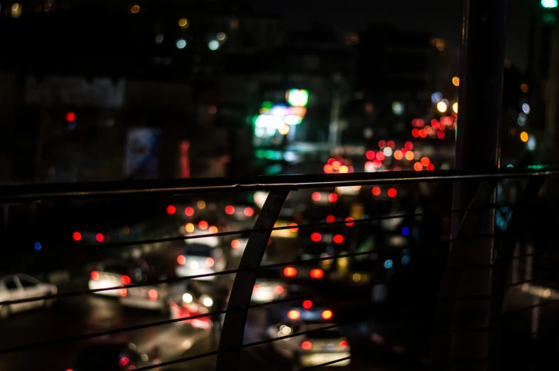 a city filled with lots of traffic at night