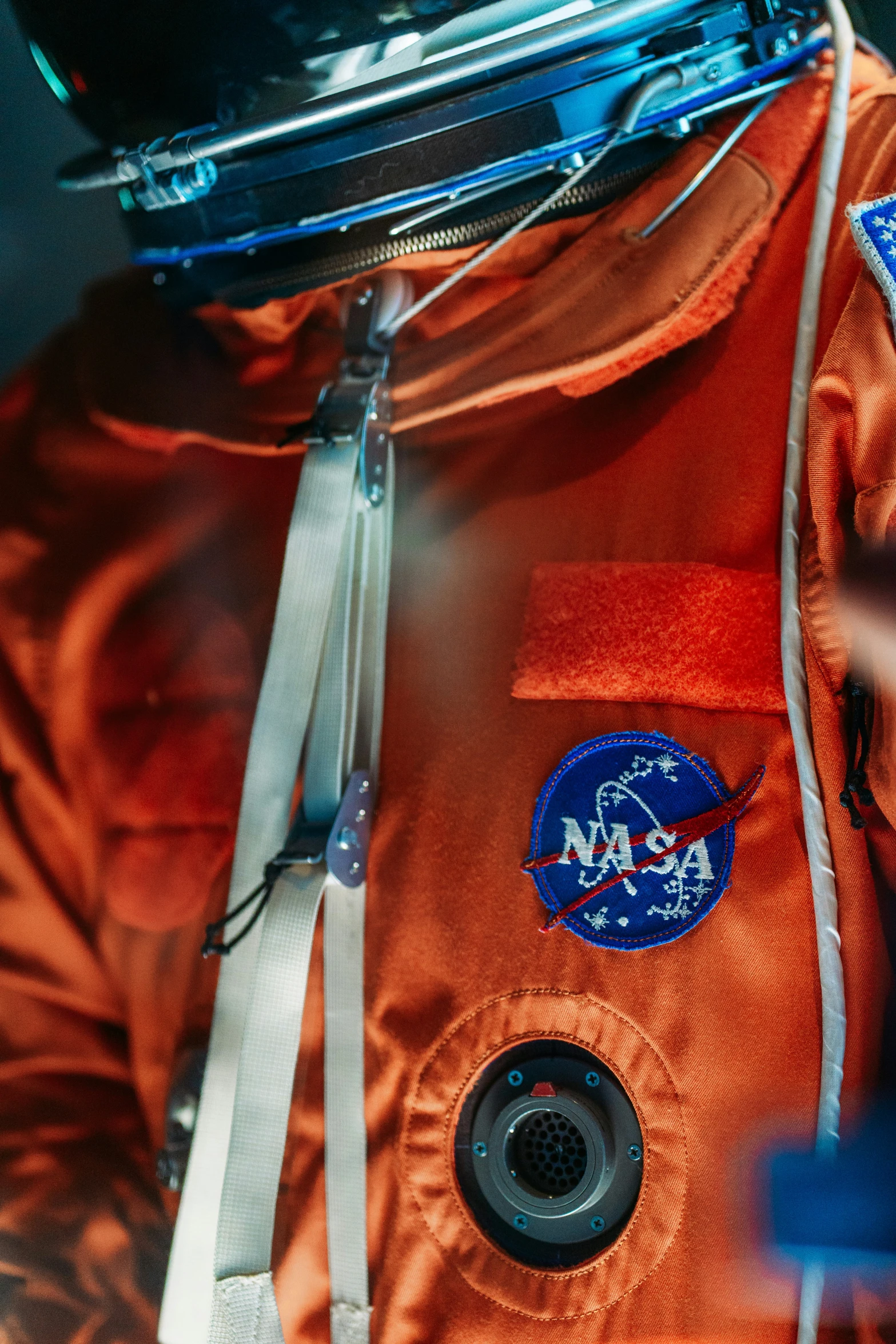 close up of the back of a nasa jacket with some patches on it