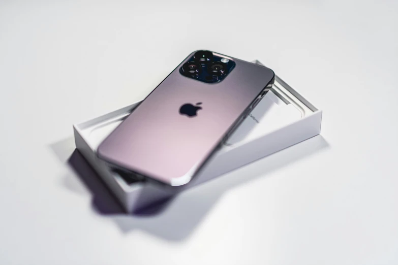 an iphone 11 is in its box on the table