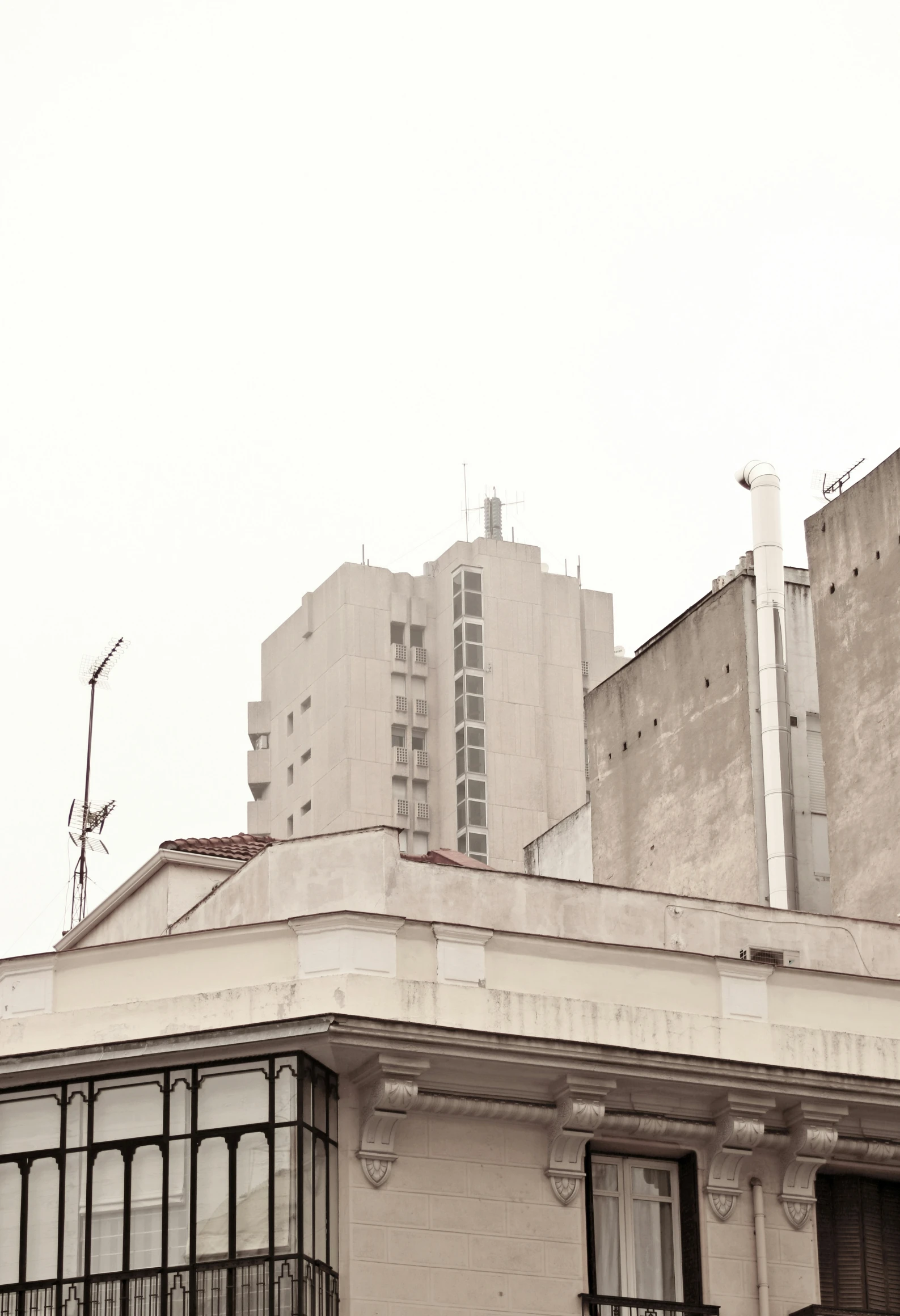 a city building with a clock on top