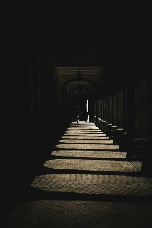 an image of a hallway going to a person