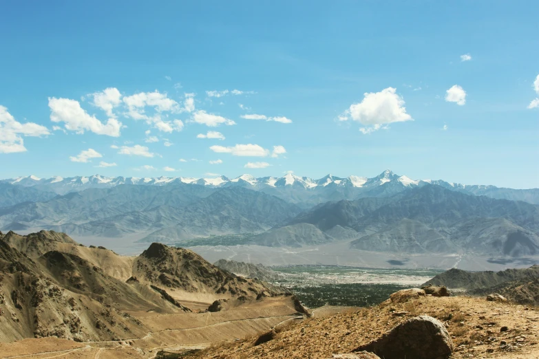 a mountain is shown with a dirt road