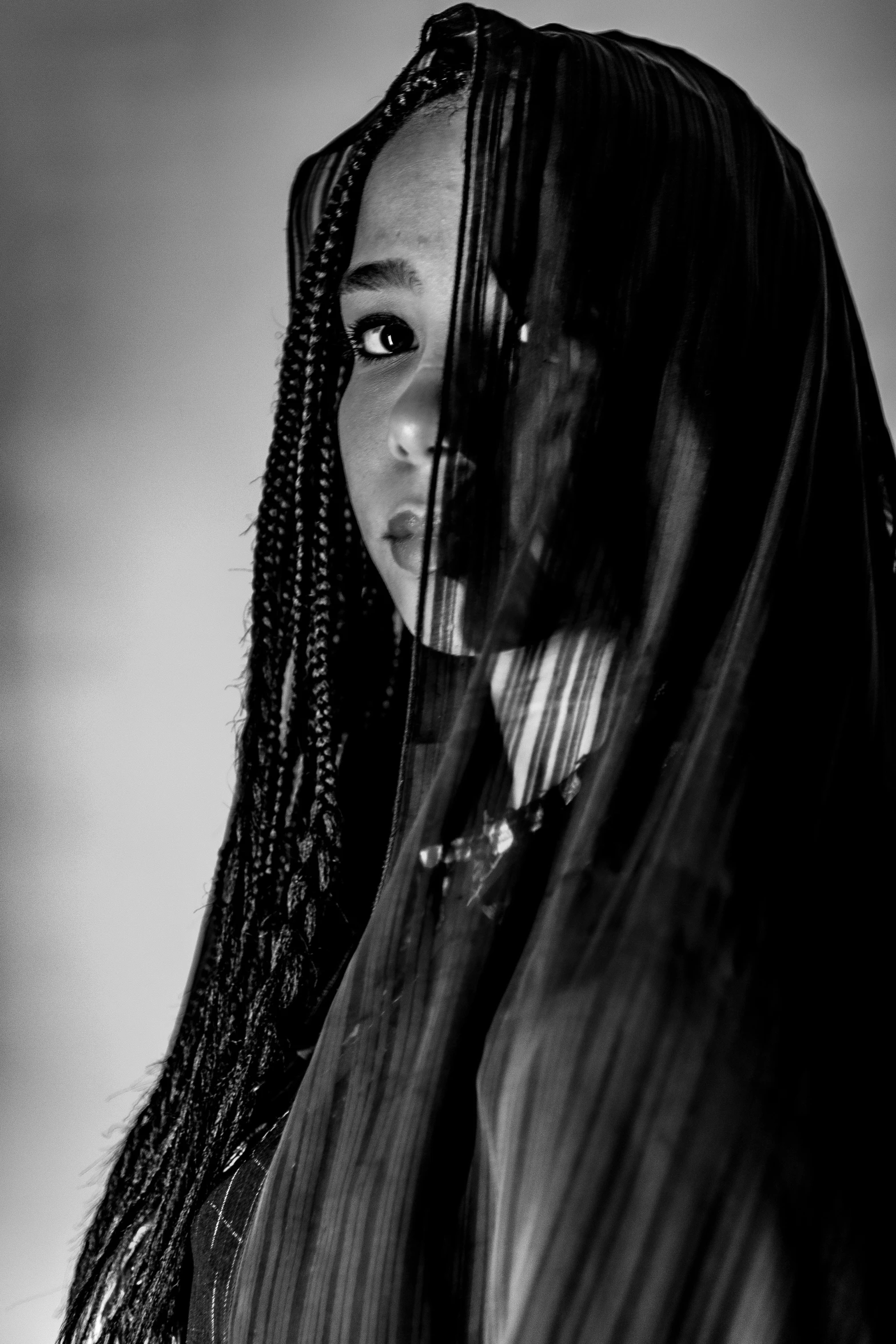 black and white portrait of woman with ids in head