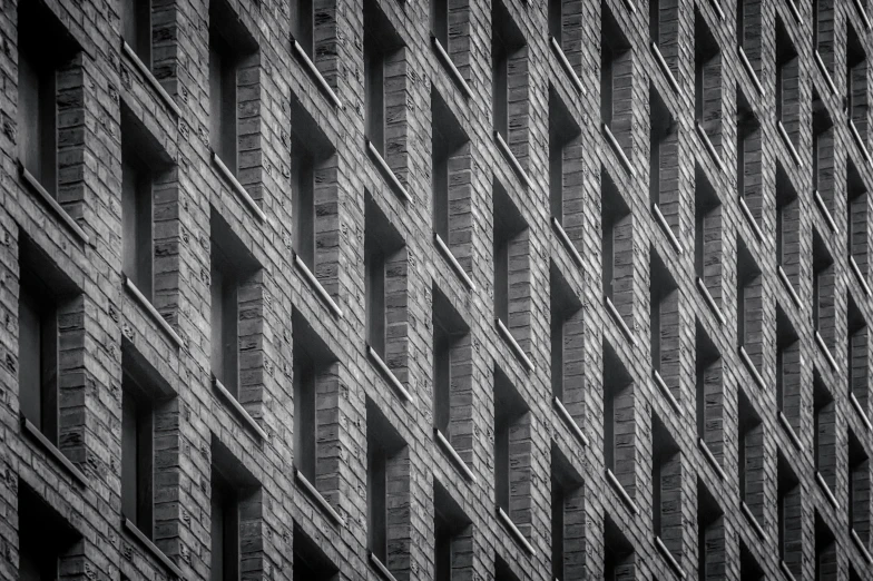 abstract black and white pograph of wall made out of words