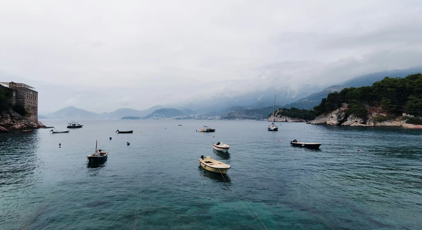 a bunch of boats that are sitting in the water