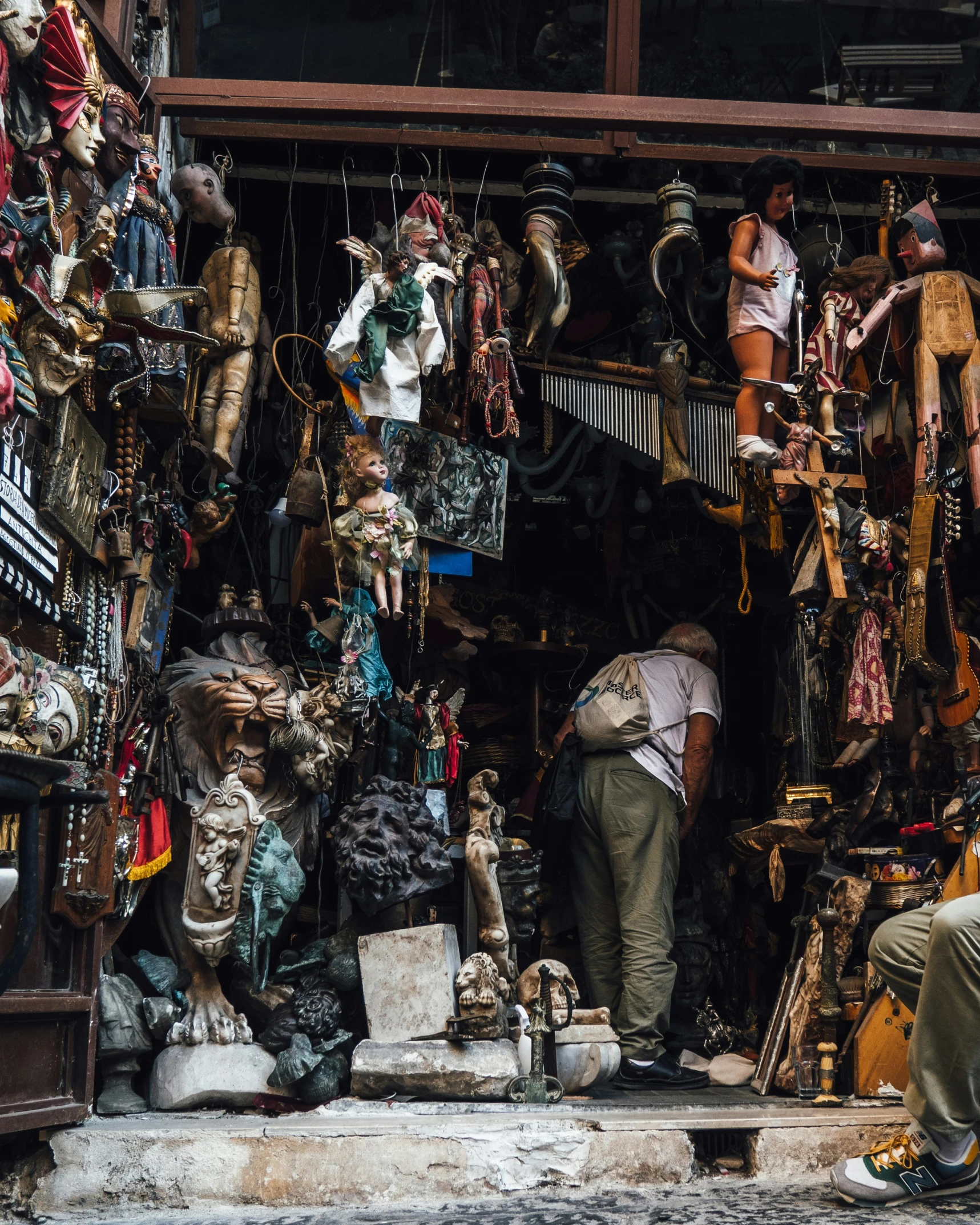 an outdoor shop with a lot of items on display