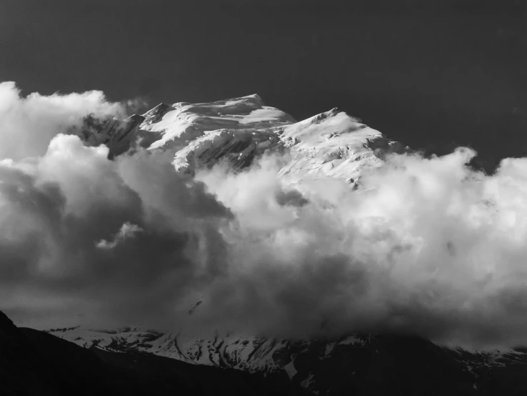 there is a snow capped mountain in the background