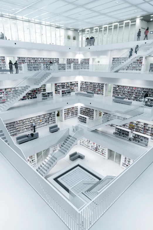 a room filled with lots of books and shelves full of them