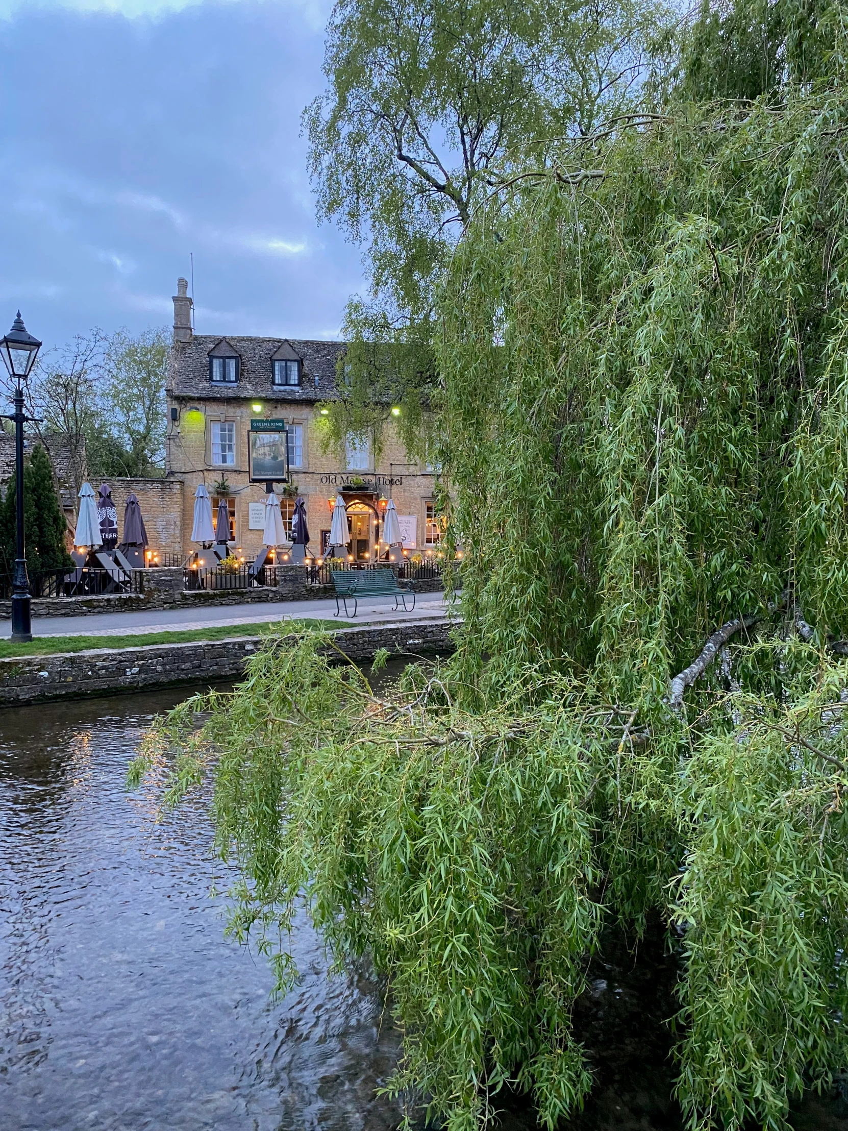 a view of a river that has a restaurant on it