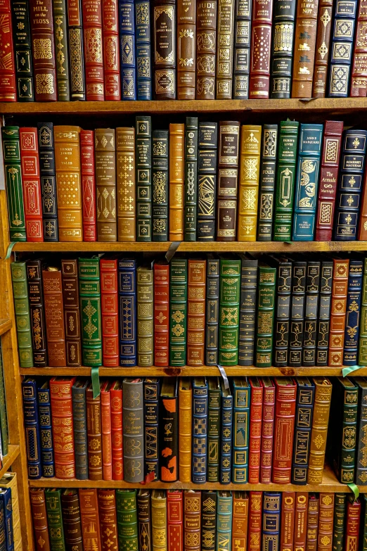 a big wooden book case filled with lots of books