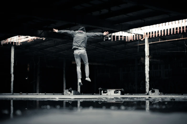 a person on a skateboard standing by a pool