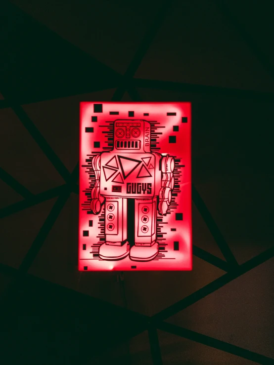 a red robot with geometric shapes is in a dark room