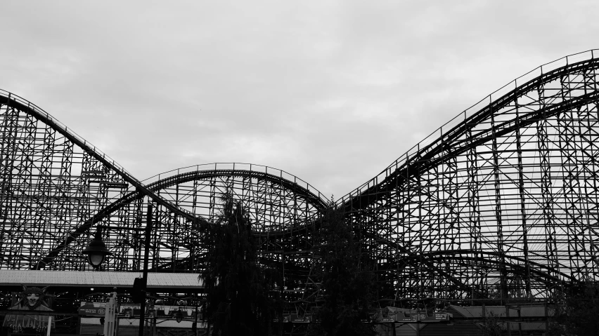 an amut park is silhouetted against the sky