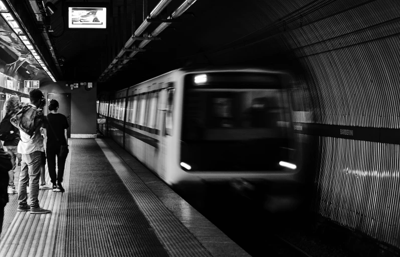 a train is moving through the subway station