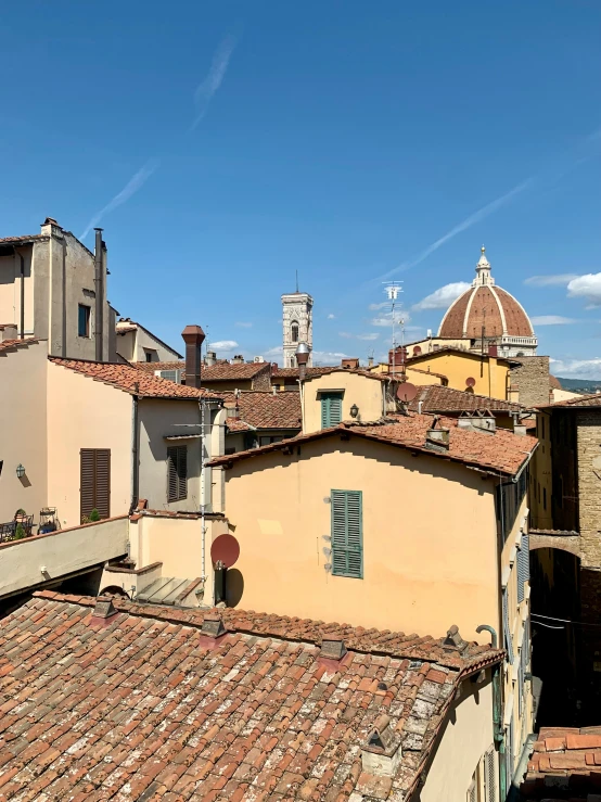 rooftops with tiled roofs and windows in an old european town