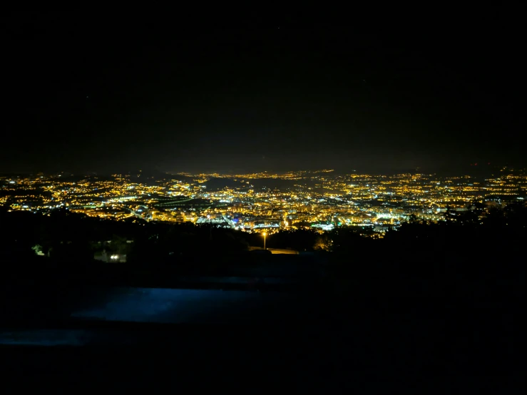 an image of a city at night from above