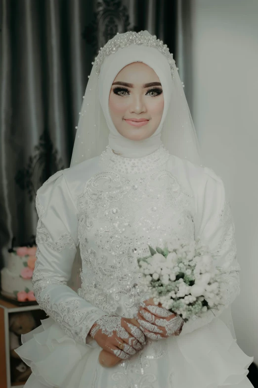 a women wearing a wedding dress in white