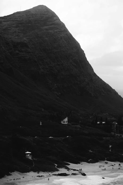 a house on a hill near the ocean