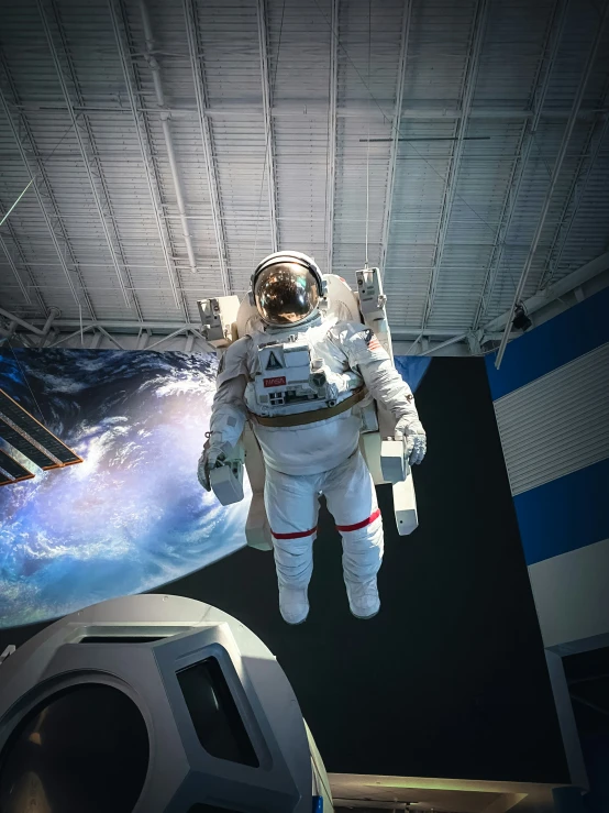 an image of a space suit floating in the air