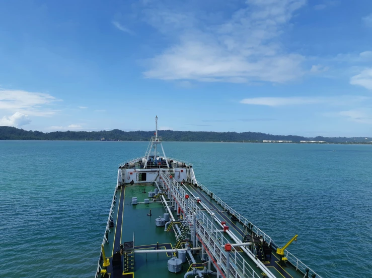 a large ship sails on the open ocean